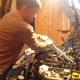 Bobby removes the cylinder head bolts from his wounded Jeep XJ.